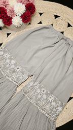 TARA GHARARA GREY
