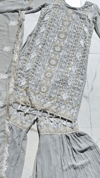 TARA GHARARA GREY